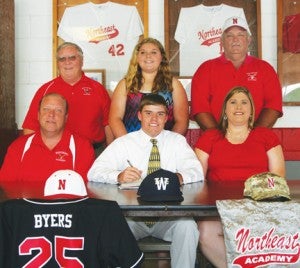 Former Northeast Academy pitcher/infielder Zach Byers (front row, center) has committed to NC Wesleyan College where he will play baseball beginning next season.  Present for the scholarship letter signing are (front row, from left) Tim Byers, father; Zach; and Shannon Byers, mother; and (back row, from left) Russell Leake, NEA Headmaster; Brittany Byers, sister; and Billy Bridgers, NEA coach. Staff Photo by Gene Motley