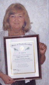 Peggy Davis Mizelle has been awarded the prestigious Order of the Long Leaf Pine.