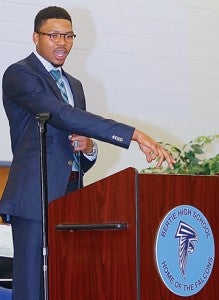 NBA Atlanta Hawks guard Kent Bazemore addresses the crowd at the Bertie County Schools Convocation on Tuesday morning.  Bazemore was on hand for the retirement of his #24 high school jersey – the first to be displayed in the new BHS gym. Photomedoc.com / Steven Ferguson