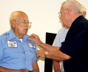 Gates County Rescue & EMS founding fathers – Durwood Evans (left, top photo) and Frank Russell (left, bottom photo) receive their 50-year service pins from Gordon Joyner, Executive Director of the North Carolina Association of Rescue & EMS. Staff Photos by Cal Bryant
