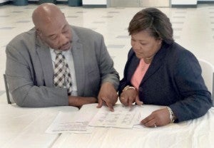 Chief District Court Judges W. Rob Lewis II (6B) and Brenda G. Branch (6A) work through the details in advance of the two Judicial Districts merging effective Jan. 1 of next year. Branch was appointed Dec. 10 as the Chief Judge of the new District. File Photo