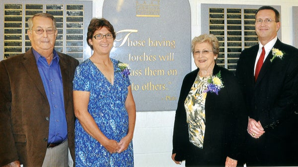 The Smith family – from left: James Sr., DeAnne, Pat and James Jr. (Jimmy) – pose at the East Carolina University Educators Hall of Fame. The family hails from Milwaukee in Northampton County. Pat, DeAnne and Jimmy, all ECU alums, were recently inducted into the Hall of Fame. Contributed Photo
