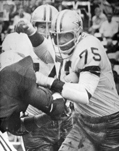 Jethro Pugh (right) is shown here during his playing days with the Dallas Cowboys. This game was against the old St. Louis Cardinals. Contributed Photo