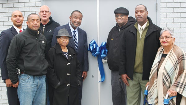 Cofield officials and representatives of USDA Rural Development gathered Thursday at the ribbon-cutting for the town’s new water system. Attending were, from left, Edward Gregory, USDA-RD; Cofield Town Council members Steven Lassiter, Anthony Archer and Nettie Brickers; George Vital, USDA-RD; Hermea Pugh, Cofield Mayor; Darrell Partlow, Town Councilman; and Julia M. Whitaker, former Mayor. Staff Photo by Gene Motley