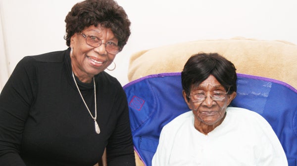 Retha White, shown here with her daughter, Mabel Tull, recently celebrated her 106th birthday. Staff Photo by Gene Motley