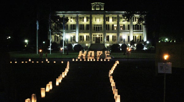 Hope is the key word at Relay for Life as those four letters are spelled out by candle lit luminaries in front of the historic Columns Building at Chowan University. Staff Photo by Cal Bryant