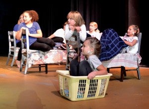 From left, Eleanor Boyd, Serena Merritt, Molly Hairston, Madilyn Strickland, Kyndall Jenkins, Catie Wise and Avery Byrum (in the basket) were just a few of the local youngsters taking part in the Gallery Theatre's 49th Youth Summer Workshop. Photo by Tim Flanagan