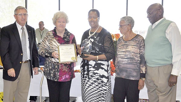 Long-time Northampton County Finance Officer Dot Vick (second from left) was honored at a retirement party held in her honor after 42 years of employment. She is shown with County Commissioners, from left, Joe Barrett, Fannie Greene, Virginia Spruill, and Robert Carter.| Photos by Bill Blanchard