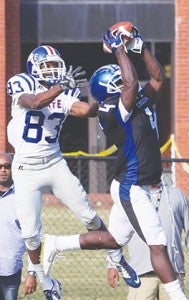Chowan’s Vincente Stafford (#4) robs Elizabeth City State’s Johnnie Nunn of a catch with one of his two interceptions late in Saturday’s CIAA game at Garrison Stadium.  Stafford and the Hawks defeated the Vikings 24-20 for the first time in school history and claimed their fifth win of the year. | Dynamic Photo - William Anthony
