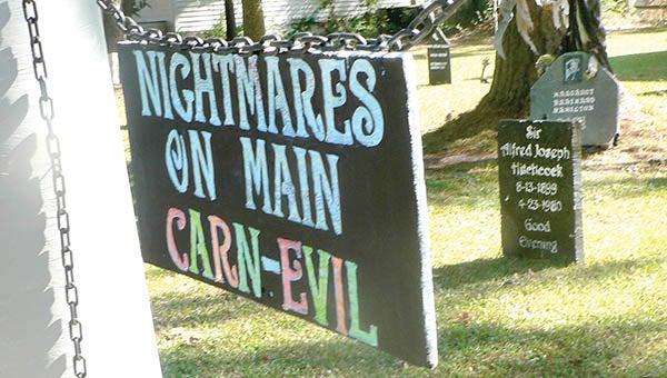 A sign points the way to 124 West Main Street in Woodland where Ken and Pattie Manuel will again host a Halloween Spectacular. | Photos by Kim Bunch Hoggard