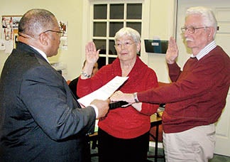 Two new members of the Woodland Town Council – Pat Liverman (center) and Cecil Harkey (right) – were sworn in on Thursday by Mayor Kenneth Manuel.