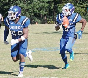 Chowan defensive back Aaron Matthews (right) follows the blocking of teammate Demetrius Newberry during his 24-yard interception return for a touchdown vs. Virginia Union. | Staff Photo by Cal Bryant