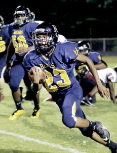 Zion Riddick (#23) is part of a contingent of Hertford County High School running backs who have combined to rush for nearly 1,600 yards this season. Dynamic Photo / William Anthony